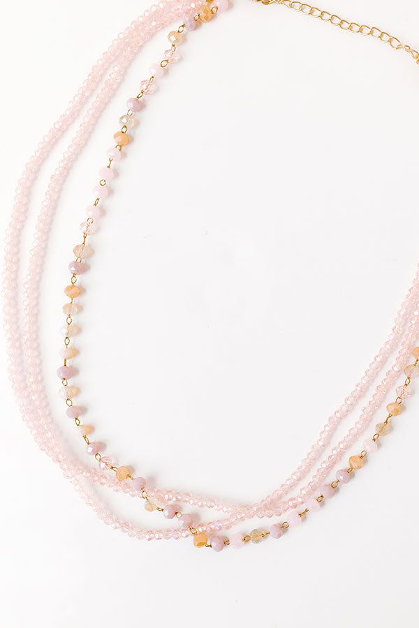 - Three different strands of shimmering rhinestone beads including one pink, purple, and gold hued strand - Gold accents - Adjustable length chain and clasp closure - Length: 15-17 inches Rhinestone Bead, Layered Necklace, Gold Accents, Layered Necklaces, Pink Purple, Beads, Chain, Purple, Pink