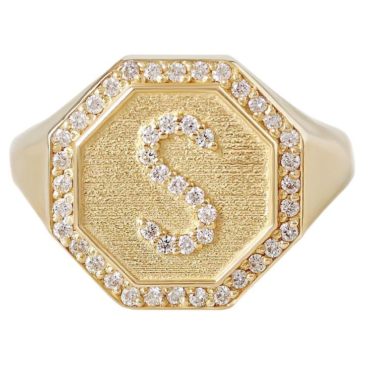 Make your mark with our Octagon Signet Diamond Initial Ring. Crafted for timeless elegance and personalized charm, it symbolizes individuality and style. D E T A I L S ♥ Diamonds: Conflict Free, 0.25CT, F color, VS clarity. ♥ Gold Color: 14K, 18K, Yellow, White, Rose gold. ♥ Sizes: 4 - 11. Select your desired ring size, gold color, and purity in the drop-down menu. Shanie, Original design by Silly Shiny Diamonds. Gold Name Ring, Art Deco Pendant Necklace, Modern Wedding Rings, Charm It, Diamond Initial Necklace, Name Ring, Name Rings, Art Deco Pendant, Gold Signet Ring