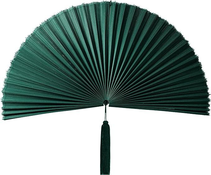 a large green fan with tassels hanging from it's side on a white background