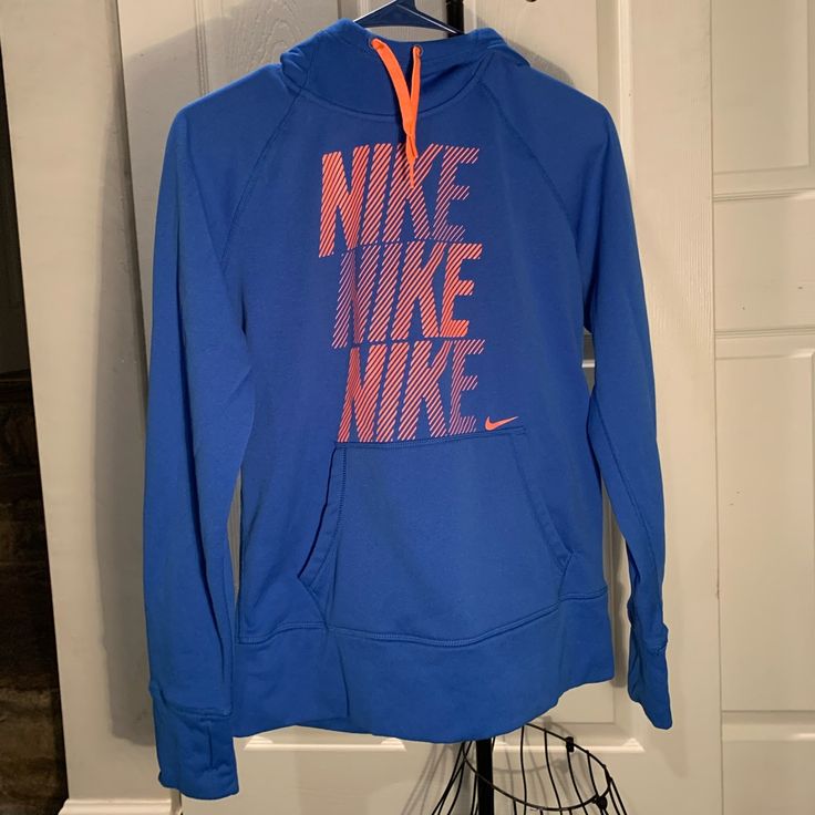 Nike Blue And Orange Ladies Therma Fit Hoodie. Includes A Front Pouch And Places To Put Your Thumbs In :) Perfect For Winter And Working Out! Size : Medium I’m Excellent Condition Like Brand New Blue Workout Hoodie Top, Blue Hoodie Top For Workout, Orange Sporty Hoodie For Sports, Sporty Orange Hoodie For Sports, Blue Long Sleeve Sports Hoodie, Blue Hooded Outerwear For Workout, Blue Nike Hoodie For Fall, Nike Blue Hoodie For Fall, Blue Sportswear Hoodie For Workout