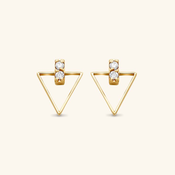 These Diamond Triangle Studs are bound to elevate your earring game to the next level. Mixing geometric shapes with diamonds, sporting these cool studs will be sure to get you the compliments you deserve. - 14k solid yellow gold - Carat weight: 0.16 ctw total - High quality diamonds, G-H color, SI1-SI2 clarity Modern 14k Gold Diamond Earrings With Single Cut Diamonds, Modern 14k Gold Diamond Earrings With Single Cut, Modern 14k Gold Diamond-cut Diamond Earrings, Modern 14k Gold Diamond Cut Earrings, Modern 14k Gold Diamond Earrings, Modern 14k Gold Earrings With Diamond Accents, Modern 14k Gold Pierced Diamond Earrings, Modern Gold Diamond Earrings, Modern Yellow Gold Diamond Cut Earrings