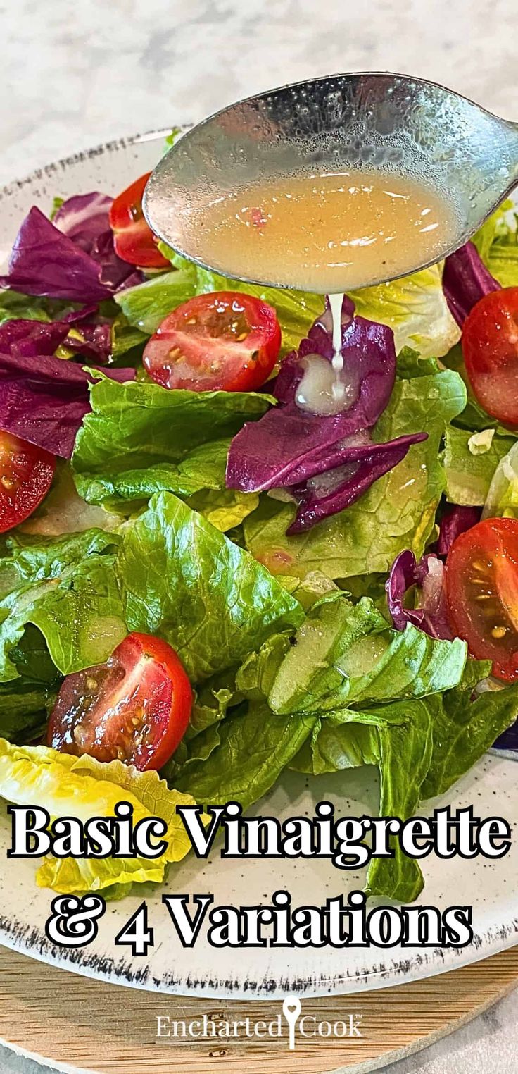 a salad with lettuce, tomatoes and dressing being drizzled onto it