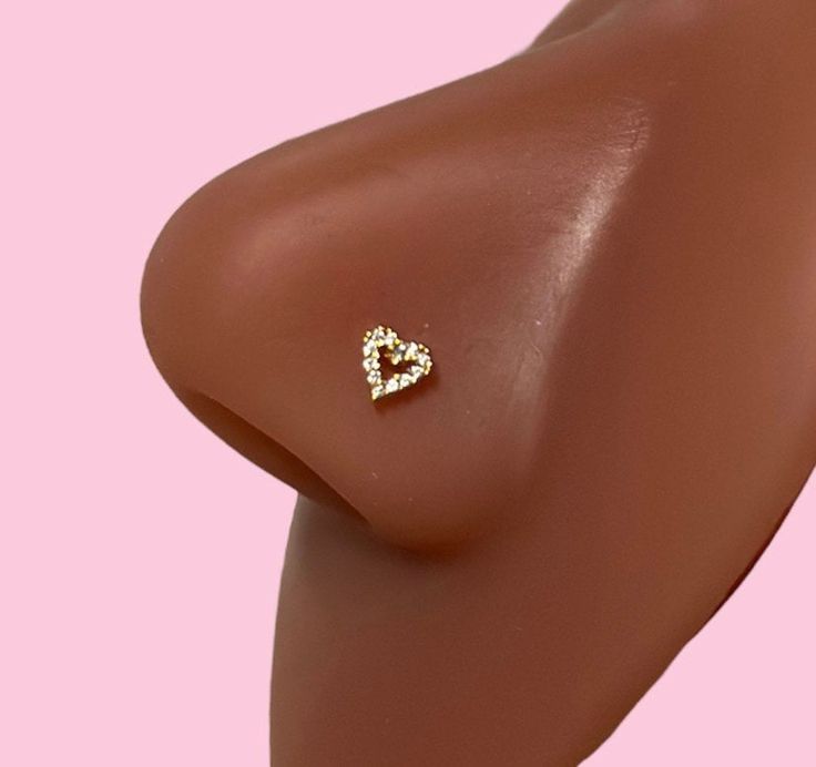 20g Mini heart nose stud (bone end) Gold plated 18k 2000s Nose Piercing, Different Types Of Nose Rings, Nose Piercing Y2k, Nose Piercing Stud Jewelry, Nose Ring Aesthetic Stud, Gold Nose Ring Aesthetic, Cute Nose Jewelry, Baddie Nose Piercing, Aesthetic Nose Piercing Stud