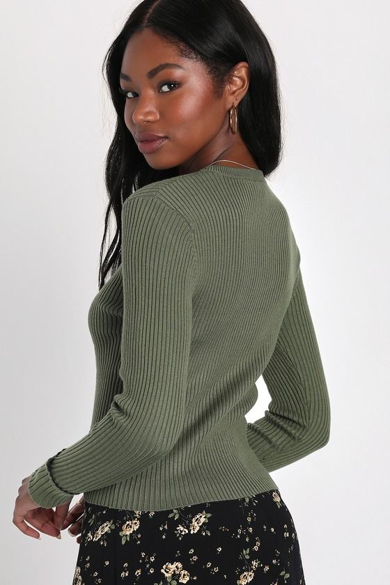 Your jeans are going to love the Lulus Basics Karlee Olive Green Ribbed Knit Long Sleeve Sweater Top! Soft and stretchy ribbed knit shapes a perfectly stretchy bodice, a rounded neckline, and long cuffed sleeves. This lightweight sweater top is a perfect basic you'll want to layer with forever! Fit: This garment fits true to size. Length: Size medium measures 20.5" from shoulder to hem. Bust: Great for any cup size. Waist: Fitted - stretchy fabric allows custom fit. Undergarments: May be worn wi Stretch Ribbed Knit Top With V-neck, Ribbed Stretch Knit Top With Crew Neck, Ribbed Stretch Crew Neck Knit Top, Stretch Knit Top With Ribbed Neckline, Casual High-stretch Ribbed Knit Top, Casual Ribbed High Stretch Sweater, Casual Ribbed High-stretch Knit Top, Ribbed Knit Top For Layering, Stretch Knit Top With Ribbing