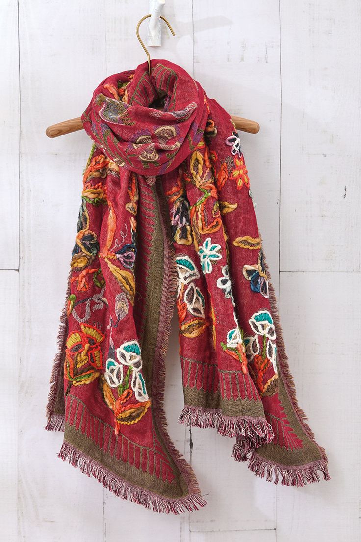 Create your own warmth with this soft, spice-hued jacquard scarf. Lavishly hand-embroidered, with space-dyed yarns for a rich, multicolored effect. Beautifully festive and artisan-inspired, with raw-edge fringe all around. Bohemian Pashmina Scarves With Floral Embroidery, Bohemian Scarves With Multicolor Embroidery, Winter Festive Embroidered Scarves, Bohemian Woven Cotton Scarves, Bohemian Embroidered Multicolor Shawl, Bohemian Multicolor Embroidered Shawl, Multicolor Embroidered Bohemian Scarves, Bohemian Shawl For Festive Fall Season, Bohemian Shawl For Fall Festive Occasion