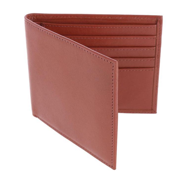 The Sergio Genuine Leather 8 Slot Bi-Fold Wallet is a simple and classic design. The wallet comes in two classy colors and is designed with an eight-slot layout that serves the basic needs of a wallet. This leather is designed to age and wear well, only getting softer and more supple with time and use. The simplistic design is suitable for the businessman, dad, grandpa, or son who just wants a classic wallet to carry about their busy day. This makes a wonderful gift for the hard-to-buy gentleman Classic Trifold Wallet In Cognac For Everyday Use, Classic Cognac Trifold Wallet For Everyday Use, Classic Cognac Bifold Card Holder, Classic Cognac Trifold Wallet With Coin Pocket, Classic Cognac Wallet With Interior Card Slots, Classic Cognac Wallets With Smooth Grain, Classic Cognac Wallet With Smooth Grain, Formal Cognac Wallet With Card Slots, Classic Brown Trifold Wallet For Formal Occasions