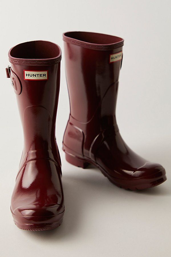 Get through rainy days with ease in these classic short rubber rain boots. In a matte rubber this style features a buckle accent on the side, logo detailing in front, and treaded rubber sole. * Pull-on style * Mid-calf height * Lifted heel | Hunter Short Wellies at Free People in Red, Size: US 7 Hunter Rubber Boots, Hunter Short, Red Rain Boots, Fox Shoes, Rubber Boots, White Fox, Christmas 2024, Hunter Boots, Rainy Days