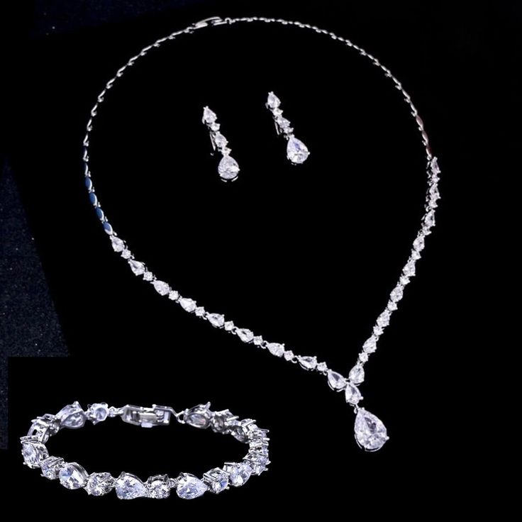 A beautiful three-piece bridal jewelry set with an incredible sparkle! Adorned with intricately faceted cubic zirconia that capture the light from every angle with a perfectly translucent appeal, the pieces are platinum / rose gold / yellow gold plated for a flawless finish which enhances the intricate detailing and conveys a modern take on old elegance. Necklace: 17" (approx. 43.2cm) long, with a secure fold-over closure. If longer is needed, please leave a note at checkout with your desired le Platinum Rose Gold, Bridal Jewelry Set, Bridal Jewelry Sets, Silver Rose Gold, Three Piece, Gold Yellow, Jewelry Set, Bridal Jewelry, Cubic Zirconia