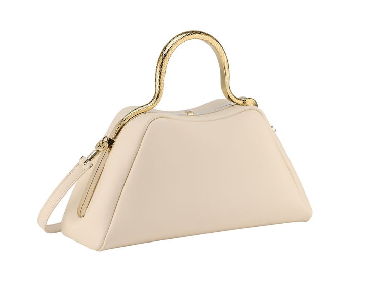 Serpentine Small Top Handle Bag In Ivory Opal Smooth Calf Leather With Black Nappa Leather Lining. Captivating Snake Body-shaped Top Handle In Gold-plated Brass Embellished With Engraved Scales And Red Enamel Eyes, Press Button Closure And Light Gold-plated Brass Hardware. High-end Cream Shoulder Bag For Evening, High-end Beige Shoulder Bag For Evening, High-end Cream Evening Bag, Cream Leather Evening Bag, Cream Shoulder Bag For Evening With Handle Drop, Luxury Leather Shoulder Bag For Events, Luxury Cream Shoulder Bag For Evening, Luxury White Leather Evening Bag, Designer Cream Shoulder Bag For Evening