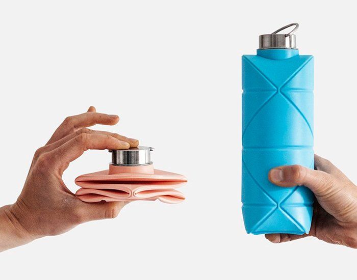 two hands holding different types of items in one hand and the other hand is holding a lighter