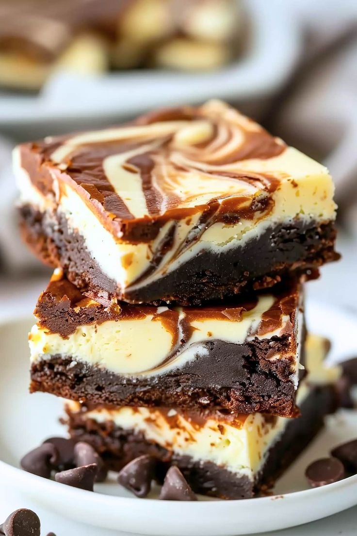 three pieces of cake on a plate with chocolate chips