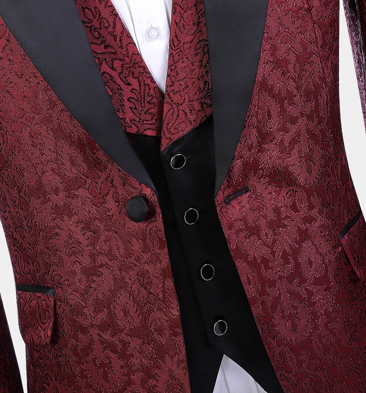 This deluxe 3 piece burgundy damask tuxedo with black lapel makes quite a statement. This fashion-forward tux is expertly handmade with an out-of-ordinary high-quality fabric. Embroidered with a deep rich burgundy damask pattern, the sleek and sophisticated look of this gentleman’s burgundy suit will have heads turning and all eyes on you. The medium-weight fabric is stain-resistant and won’t have you overheating. Taking your formal wear to the next level without breaking the bank is simple and Maroon Tuxedo, Burgundy Tuxedo, Burgundy Suit, Rich Burgundy, Tuxedo Suit, Single Breasted Jacket, Damask Pattern, Suit Shop, All About Eyes