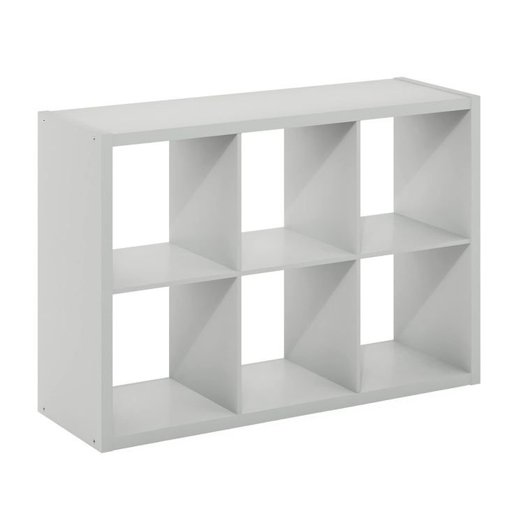 a white shelf with four shelves on each side