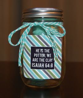 a mason jar with a message on the label that says he is the potter, we are the clay