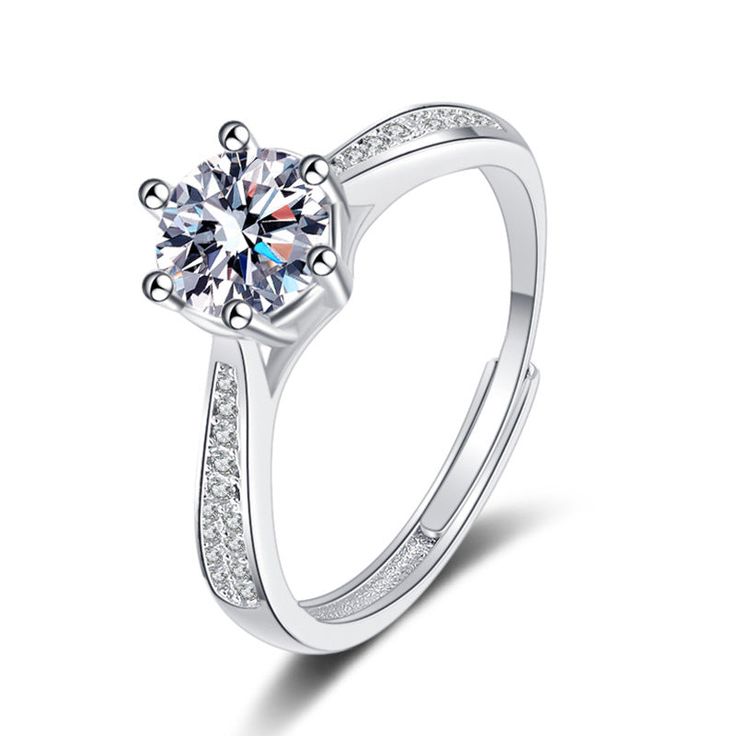 This Silver Starlight Six Claw Moissanite Ring is crafted from sterling silver and set with a dazzling six-claw Moissanite gemstone. This handmade ring is sure to sparkle and shine for years to come. Product Details: Material: 925 Sterling Silver Stone: Moissanite Diamonds/D /1 carat Weight: about 2.72g Size: Adjustable Open Size Diamond Size: 6.5mm SKU: AN23102501 Keywords: moissanite rings, moissanite engagement rings, moissanite ring, moissanite diamond ring, moissanite engagement ring, what Engagement Rings Moissanite, Rings Moissanite, Moissanite Engagement Rings, Blood Diamond, Moissanite Diamond Rings, Ring Moissanite, Creating Jewelry, Blue Zircon, Moissanite Ring