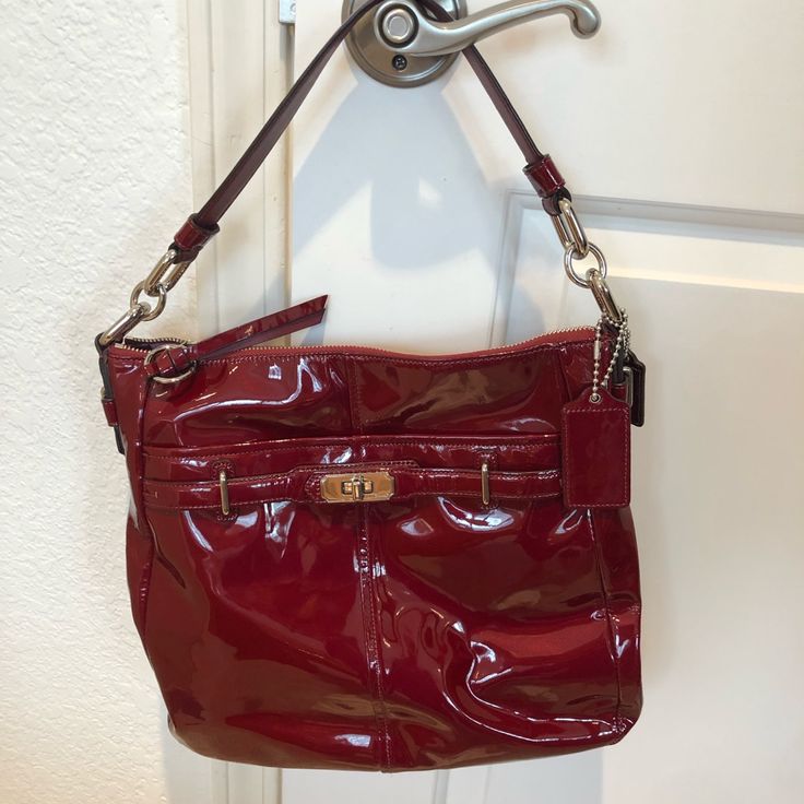 Red Patent. Never Used. Comes With Dust Bag Coach Burgundy Bag With Adjustable Strap, Red Hobo Bag With Removable Pouch For Shopping, Red Hobo Bag With Removable Pouch For Errands, Red Bucket Satchel For Shopping, Coach Red Satchel With Removable Pouch, Coach Red Satchel With Detachable Strap, Coach Burgundy Shoulder Bag With Adjustable Strap, Coach Red Satchel Bag, Red Coach Satchel Bag