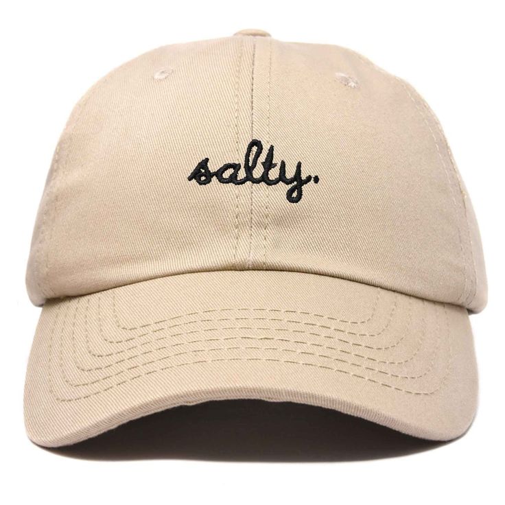 Embrace the laid-back charm of coastal living with our Salty baseball cap. Crafted from 100% cotton, our 6-panel low-crown dad cap combines comfort with effortless style. Whether you're strolling along the boardwalk, lounging on the sand, or simply running errands under the sun, our cap promises a blend of functionality and fashion that suits every beach lover's lifestyle. Measuring 11 inches in length, this unstructured cap features a fabric strap closure with a metal buckle, ensuring a secure Cream Cotton Dad Hat With Curved Visor, Casual Vacation Hats With Embroidered Logo, Beach Baseball Cap With Curved Bill For Baseball Season, Casual Embroidered Baseball Cap For Beach, Casual Beach Baseball Cap With Letter Print, Casual Dad Hat With Letter Print For Outdoor, Curved Bill Baseball Cap For Beach And Baseball Season, Comfortable Adjustable Baseball Cap, Adjustable Comfortable Baseball Cap