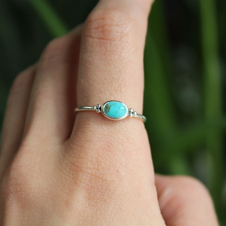 Material: 925 Sterling Silver -Turquoise Weight: 1.1g Height: 7mm Stone: 3mm Size guide included as a photograph  Free UK first class postage  Eco-friendly packaging Based in Dorset, UK As all of our natural stones are created by Mother Nature, each stone is unique in appearance, so may look different from the stone photographed. Dainty Oval Sterling Silver Stackable Rings, Adjustable Oval Turquoise Promise Ring, Adjustable Dainty Oval Birthstone Ring, Dainty Silver Turquoise Ring Gift, Elegant Oval Turquoise Ring Nickel Free, Elegant Oval Nickel-free Turquoise Ring, Oval Turquoise Gemstone Ring In Sterling Silver, Dainty Sterling Silver Turquoise Gemstone Ring, Dainty Sterling Silver Turquoise Ring