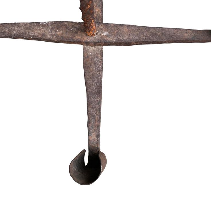 an old rusted metal object on a white background