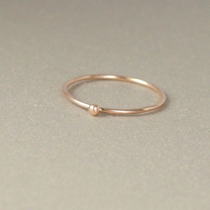 ONE dainty (1mm) solid 14k gold stacking band is adorned with a teensy 14k gold droplet. Small and dainty, stack several as a set or wear with some of the other stacking rings in our collection for variety. We think you could love these, too: ►Sterling SILVER tiny droplet ring: http://etsy.me/1x03Qe2 ►Gold GEMSTONE stacking ring: http://etsy.me/1zpjYI0 ►Gold INITIAL ring: http://etsy.me/1gamTHo ** Enjoy browsing our shop: http://etsy.me/1mC0gmu ** {YOU CAN SAVE!} Think bridesmaids, gifts, keep o Simple Rose Gold 14k Gold-filled Stackable Rings, Simple 14k Rose Gold-filled Stackable Rings, Simple 14k Rose Gold Filled Stackable Rings, Dainty 14k Rose Gold Stackable Rings, Minimalist Stackable 14k Rose Gold Rings, 14k Rose Gold Minimalist Stackable Rings, Minimalist 14k Rose Gold Stackable Rings, Minimalist 14k Rose Gold Stackable Round Band Rings, Minimalist Rose Gold Stackable Rings