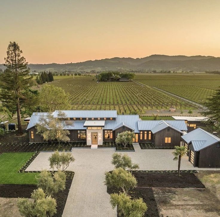 an aerial view of a home in the country