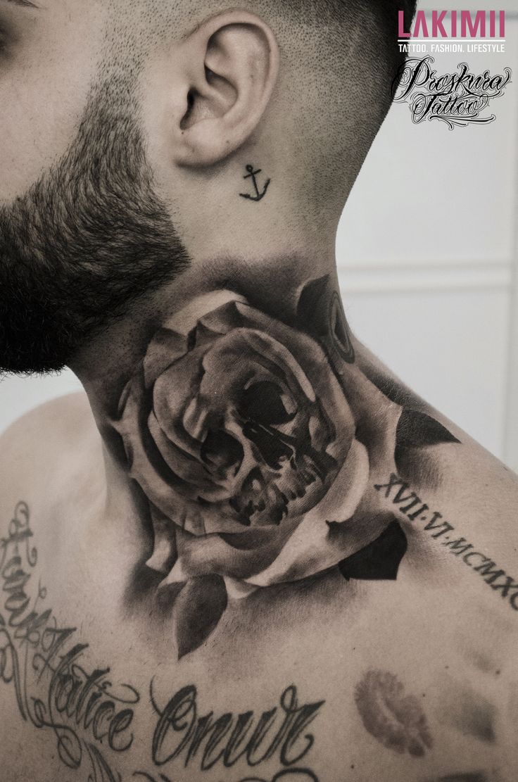 a man with a rose tattoo on his neck