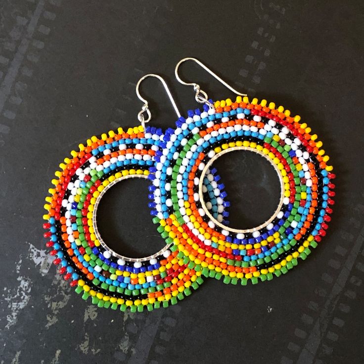 Hoop Dangle Earrings Hoop Earrings Boho Earrings Tribal Ethnic - Etsy Bohemian Multicolor Hoop Earrings, Bohemian Hoop Beaded Earrings With Colorful Beads, Bohemian Multicolor Hoop Jewelry, Multicolor Bohemian Hoop Jewelry, Bohemian Multicolor Hoop Earrings For Festival, Traditional Handmade Multicolor Hoop Earrings, Colorful Bohemian Hoop Jewelry, Handmade Traditional Multicolor Hoop Earrings, Handmade Multicolor Traditional Hoop Earrings