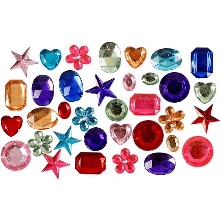 many different colored stones and stars on a white background