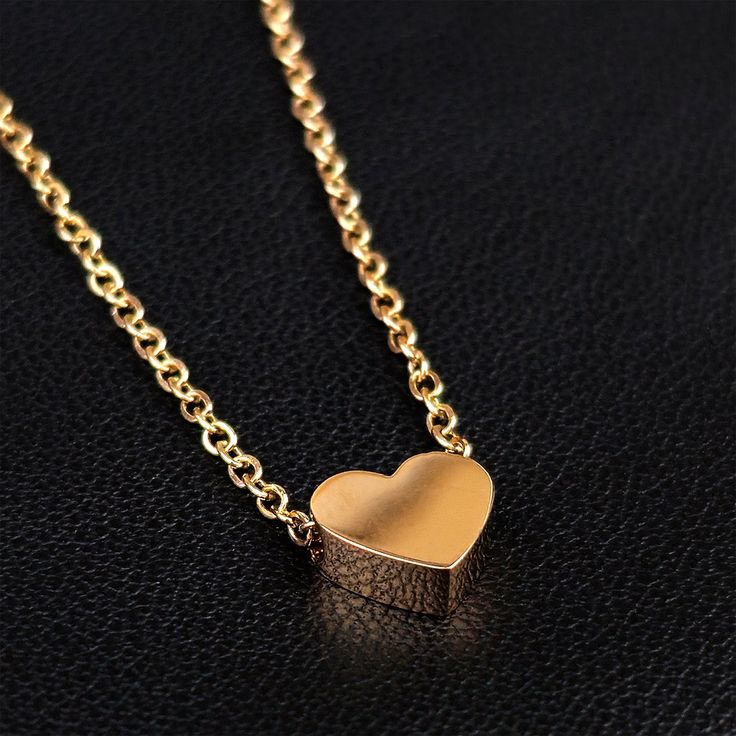 Product Details Hypoallergenic jewelry for sensitive skin Stainless Steel Rose Gold Tone PVD Chain Dainty Heart Pendant Necklace Indulge in timeless elegance with our Women's Stainless Steel Dainty Heart Pendant Necklace featuring a captivating Solitaire Heart Pendant. This exquisite necklace is designed to capture attention and adorn you with understated sophistication. This stainless steel chain necklace is built to withstand the test of time. The durable construction ensures that you can enjo Stainless Steel Chain Necklace, Rose Gold Chain, Hypoallergenic Jewelry, Women's Jewelry And Accessories, Heart Pendant Necklace, Steel Chain, Stainless Steel Chain, Women's Jewelry, Heart Pendant