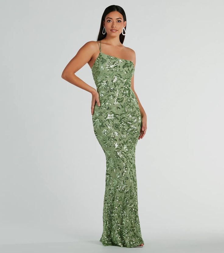 Get a luxe look for your next fancy night out in the stunning Meredith sequin formal dress. She features a sleeveless bodice, an asymmetrical one-shoulder neckline with dual adjustable spaghetti straps, and a back zipper and hook and eye closure. She has a floor-length, form-hugging mermaid silhouette to highlight your curves. The dress is composed of a sheer mesh fabric with an all-over gorgeous sequin embroidered floral design and includes a stretchy knit lining. Complete your outfit with rhin Sage Green Dress Prom, Wedding Guess, Dress Satin Bridesmaid, Dream Prom Dress, Sage Green Dress, Beach Wedding Guest Dress, Dream Prom, Sequin Formal Dress, Cocktail Outfit