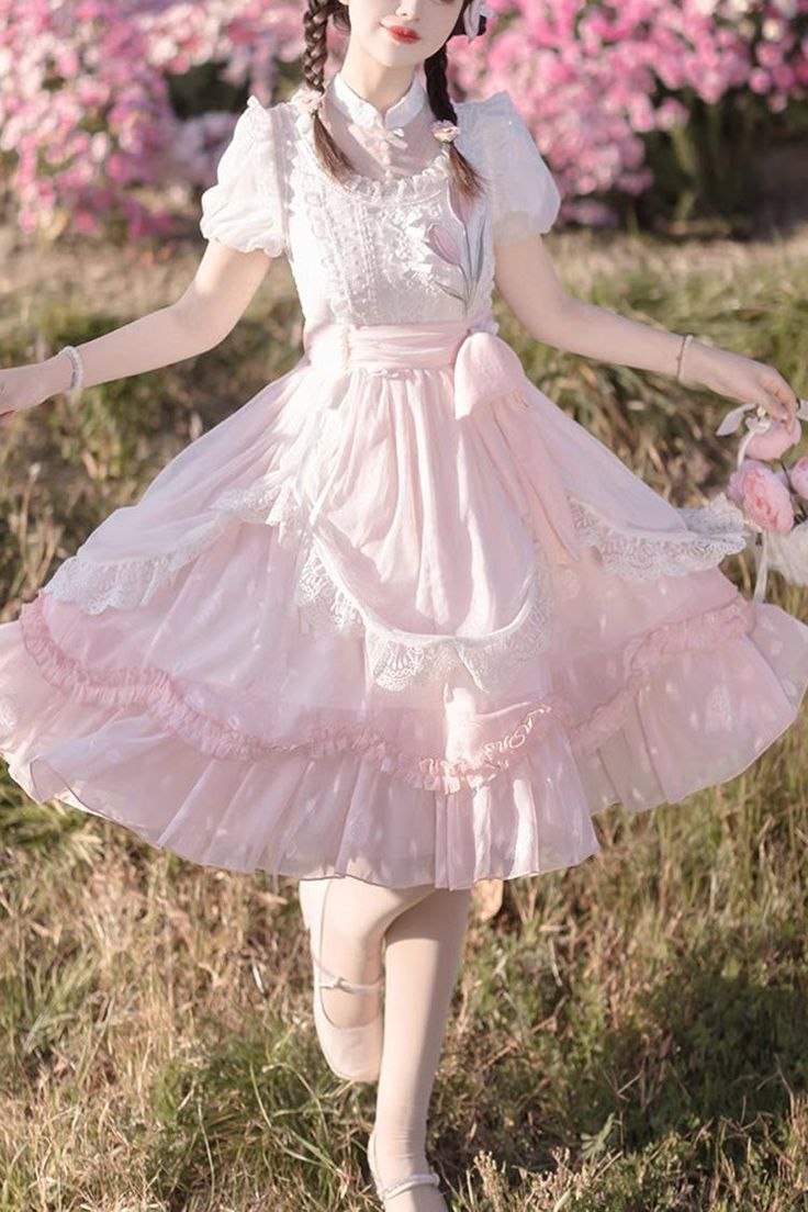 Kawaii Summer Dress With Lace Trim, Sweet Party Dress With Ruffle Hem, Cute Pink Dress With Ruffled Skirt, Sweet Tiered Ruffle Dresses, Sweet Ruffle Dress For Garden Party, Sweet Ruffled Dress For Garden Party, Sweet Short Sleeve Wedding Dress, Sweet Pink Dresses For Garden Party, Cute Short Sleeve Dress With Ruffled Skirt