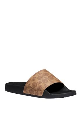 Complete with a sporty silhouette, these slide sandals are printed with a stylized COACH 'C' logo. | COACH Women's Udele Sport Slide Sandals, Tan, 9M Coach Slide Sandals For Spring, Coach Open Toe Slides For Summer, Coach Summer Open Toe Slides, Sporty Brown Slides For Summer, Coach Open Toe Slides With Removable Insole, Brown Sporty Sport Sandals For Summer, Brown Sporty Sandals For Summer, Sporty Brown Sport Sandals For Summer, Coach Flat Slides For Beach