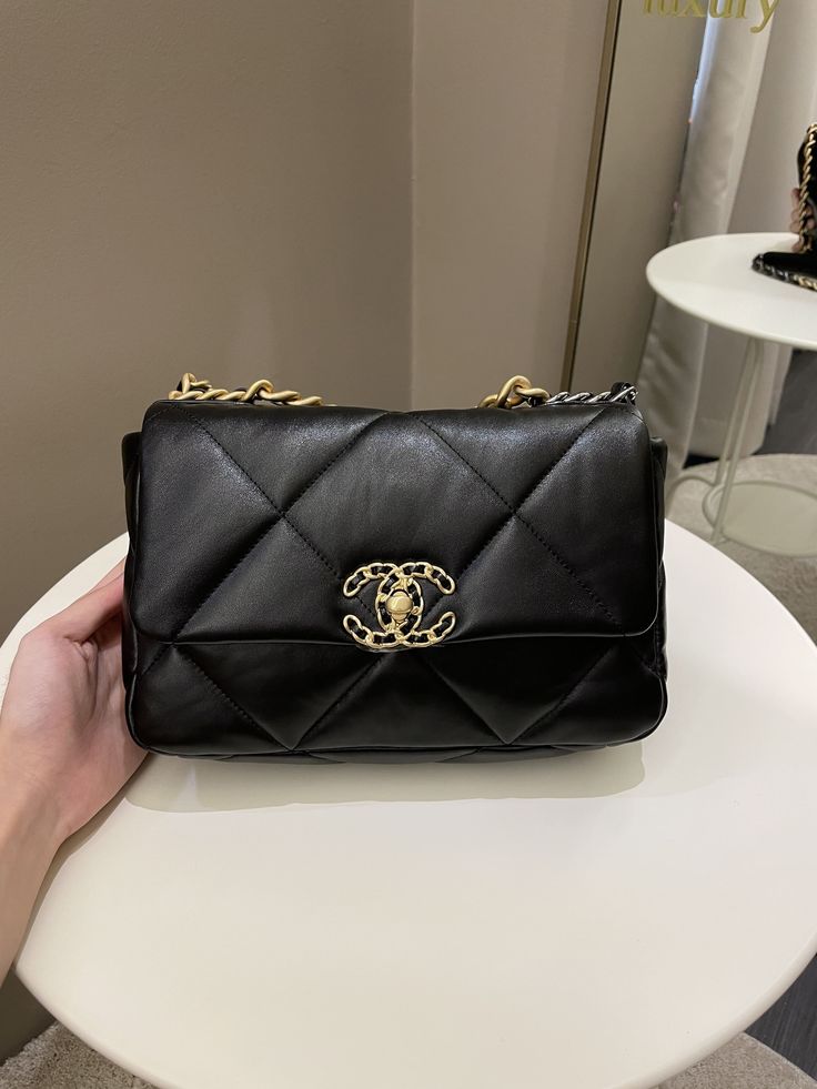 Chanel 19 Flap BagBlack Lambskin AGHWSmall 26 x 17 x 8 cmChain drop 46 cmMicrochipMarch 2022New Kept Unused (minimal storage sign if any otherwise new)Includes full set box, dust bag and receiptRTP 9160 sgdPrice now 7400 sgd 5500 usd CN5530-01 Black Double Flap Bag For Daily Use, High-end Black Rectangular Flap Bag, High-end Black Flap Bag With Dust Bag, High-end Black Square Flap Bag, Black Rectangular Flap Bag, High-end Black Flap Bag For Business, Black Double Flap Bag For Business, Black Double Flap Bag For Office, Black Double Flap Business Bag