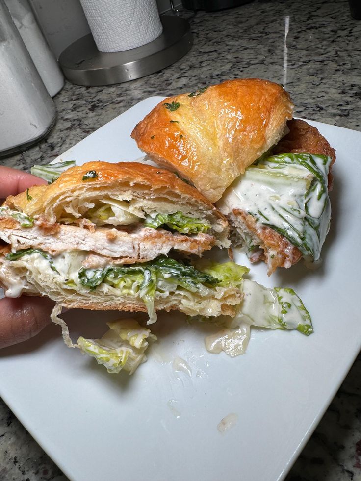 the sandwich is cut in half and ready to be eaten