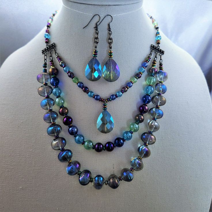 "Shimmering Bold Iridescence   18\" first row 24\" last row  Beautiful shimmering iridescent colors  Glass beads Gunmetal chain & Lobster, 2\" extension with dangle  ERL = 2 1/2\"" Brave Wings, Crystal Necklaces, Loop Earrings, Agate Necklace, Blue Necklace, Blue Agate, Glass Crystal, Jewelry Ideas, Necklace Set