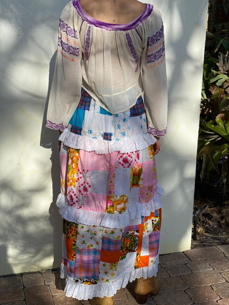 "late 1960's, early 1970's handmade patchwork maxi skirt. For the peasant blouse, go here: https://www.etsy.com/listing/1006044900/vintage-embroidered-peasant-blouse-pink?ref=shop_home_active_3 Waist: 26\" Hips: 40\" Length: 40\" Circa: late 1960's, early 1970's Condition: Good vintage condition. Normal wear. A few little rips to the waist band, otherwise normal wear throughout. Handmade with love :) Follow out IG for cool stuff---closetcasevintage instagram.com/closetcasevintage Please read our Vintage Long Skirt With Patchwork, Hippie Patchwork Maxi Skirt, Vintage Patchwork Tiered Skirt, Vintage Tiered Skirt With Patchwork, Vintage Tiered Patchwork Skirt, Vintage Patchwork Skirt For Festival, Vintage Patchwork Skirt, Blue Leather Skirt, Lace Cottagecore