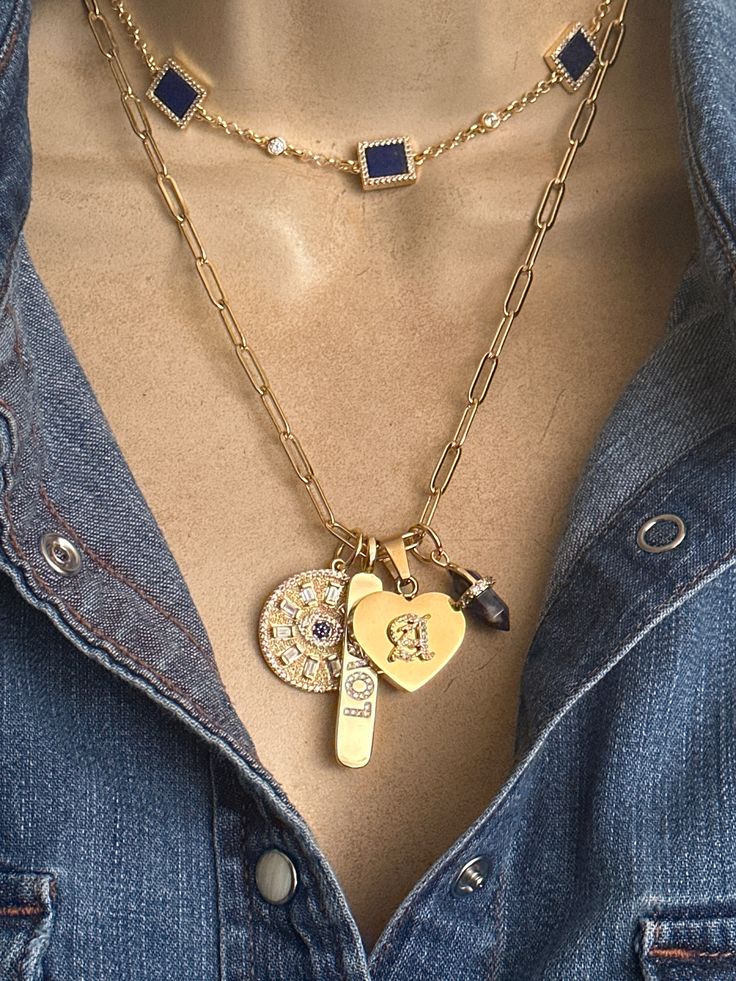 Personalized necklace with four charm: Gold plated heart with personalized CZ old English font, Lapis gemstone spike gold plated CZ, gold plated script LOVE tag and gold plated Evil eye medallion with clear/blue CZ. Gold plated open link chain. Adjustable length 17-19 inches. 💙Blue station necklace sold separately. It is available in my shop.  🎁All orders are shipped in a box. Heart Pendant Jewelry With Removable Charms As Gift, Fine Jewelry With Heart Charm Dangle, Fine Jewelry Dangle Heart Charm, Fine Jewelry Dangle Earrings With Heart Charm, Everyday Medallion Jewelry With Charms, Anniversary Pendant Charm Necklace With Removable Charms, Gold Plated Heart Charm Jewelry, Gold-plated Heart Charm Jewelry, Gold Heart-shaped Jewelry With Charms