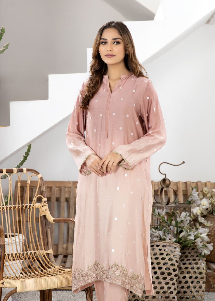 Tea pink pure cotton net shaded shirt handworked with sequins and beads all over. Comes with matching pure viscose silk pants. Pink Dabka Work Kurta For Party Wear, Pink Festive Party Wear Kurta, Festive Pink Party Wear Kurta, Pink Long Sleeve Lawn Suit With Zari Work, Pink Lawn Suit With Long Sleeves And Zari Work, Pink Long Sleeve Sequin Set, Pink Sequined Kurta For Party, Pink Cotton Silk Lawn Suit With Dabka Detailing, Pink Sequined Salwar Kameez For Eid