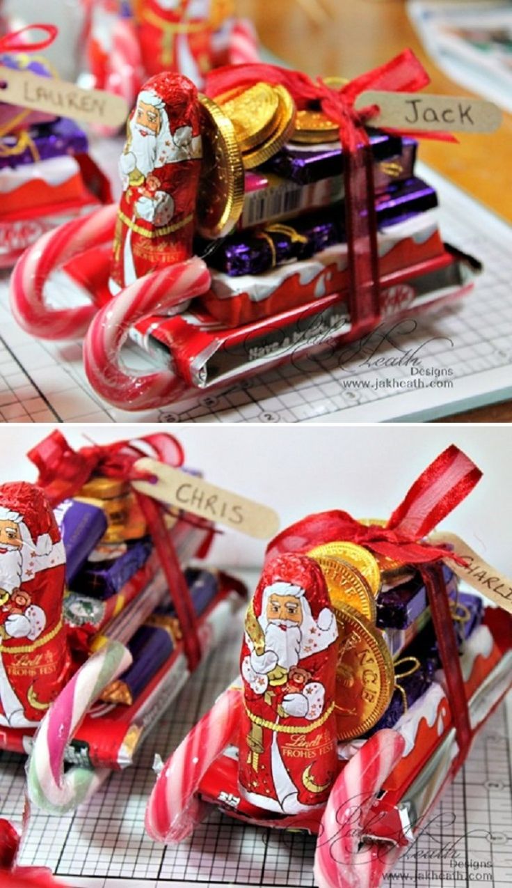 some kind of candy with santa clause on top and other candies in the bottom