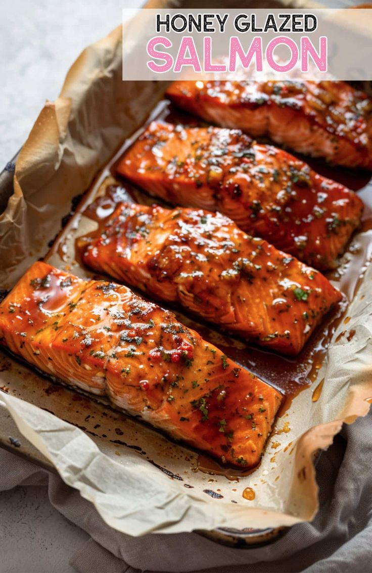 honey glazed salmon in a pan with text overlay