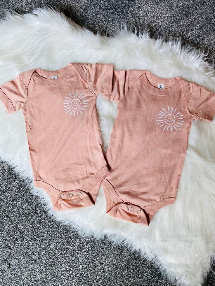 Super cute peach sunshine bodysuit/tee. Perfect gift for your favorite kiddo or baby shower gift. Color of bodysuit/tee is peach (soft pink/orange). **color can appear different on phone/computer screen** *Buy 2+ items from graceandnoelle = FREE SHIPPING! [no code needed] Cute Short Sleeve Onesie For Summer, Pink Cotton Bodysuit For Summer, Trendy Cotton Short Sleeve Bodysuit For Spring, Cute Short Sleeve Summer Bodysuit, Playful Pink Short Sleeve Onesie, Pink Short Sleeve Bodysuit For Summer, Casual Pink Short Sleeve Bodysuit For Summer, Cute Summer Bodysuit, Cute Short Sleeve Bodysuit For Spring