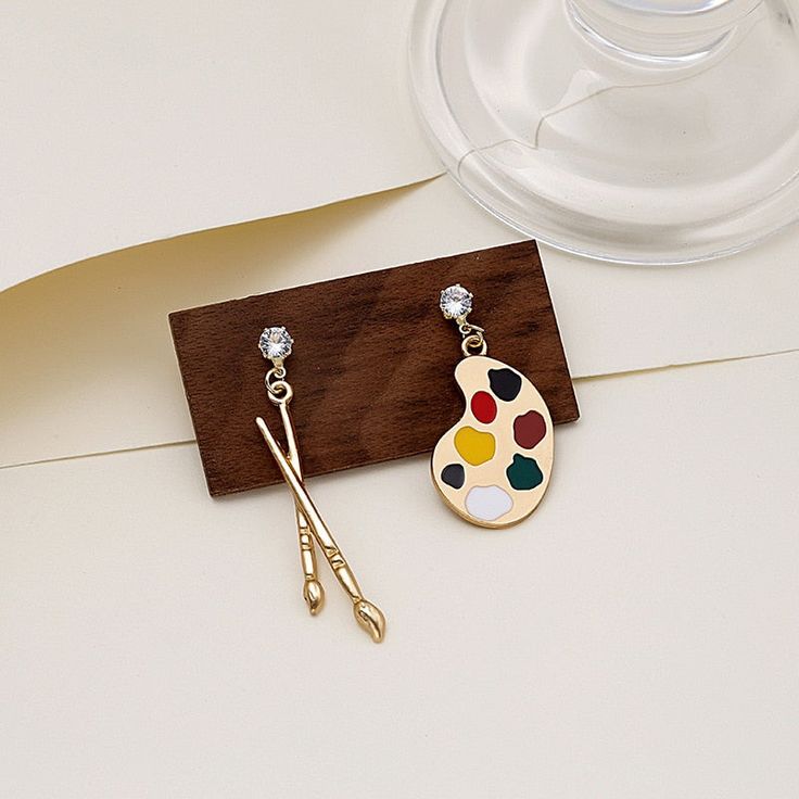 Shape\pattern: Painting Palette & Brushes Metals Type: Zinc alloy Earring Type: Drop Earrings Colorful Fairy, Brush Drawing, Asymmetrical Earrings, Light Earrings, Retro Earring, Stud Style, Alloy Earrings, Mismatched Earrings, Pearl Hoop Earrings