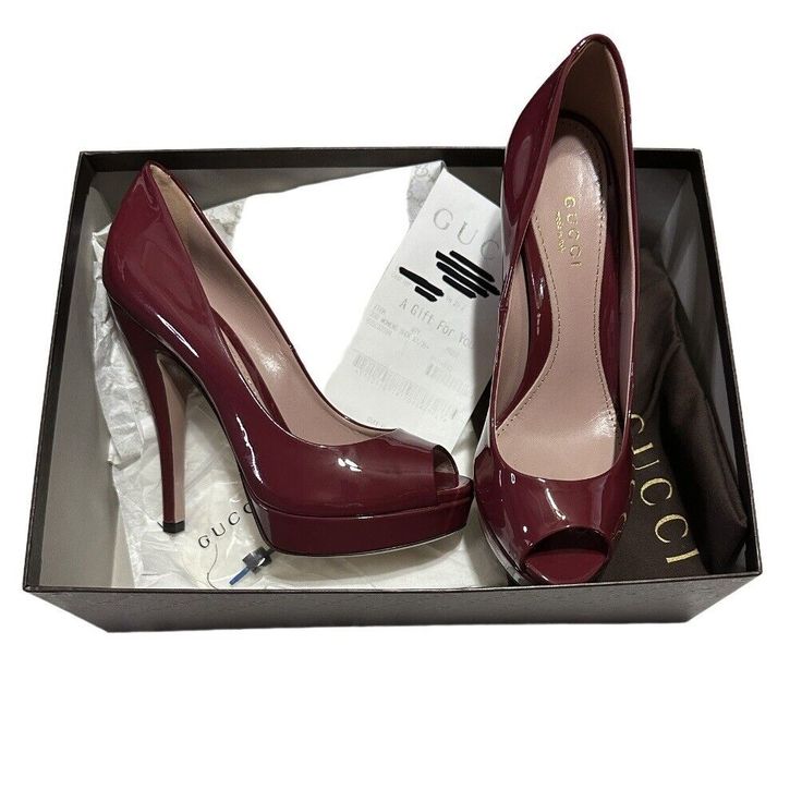 GUCCI Burgandy/wine patent leather open toe stilletto platform pumps. Size: 36.5 Heel height: 5 inches. Toe height 1 inches. 100% Authentic. New in box, excellent condition. Very tiny scuff on bottom of shoe (as shown in picture). Made in Italy. Please see all pictures for condition and measurements to ensure a proper fit before purchasing. Gucci Pumps, Beautiful Heels, Cute Boots, Aesthetic Shoes, Body Electric, Carrie Bradshaw, Book Decor, Gucci Shoes, Platform Pumps