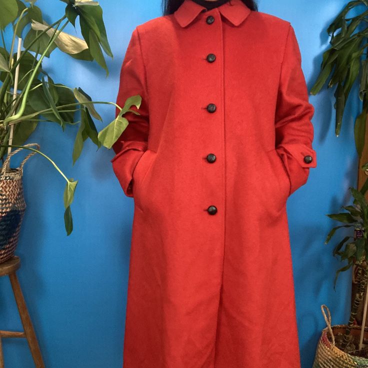 Vintage Long Outerwear With Pockets, Vintage Long Wool Coat With Pockets, Vintage Long Outerwear For Fall, Vintage Red Wool Outerwear, Red Vintage Wool Outerwear, Vintage Long Wool Coat, Classic Red Long Wool Coat, Retro Long Winter Outerwear, Vintage Single-breasted Wool Coat With Long Sleeves