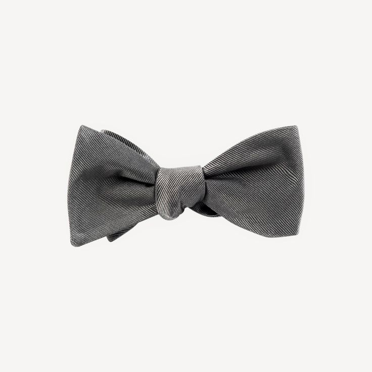 We've partnered with The Tie Bar to bring you this classic assortment of hand tied bowties in a variety of colors. Size is 2.5 in. wide x 58 in. long. Material: Handmade of 100% Silk Fabric Care: Imported, Dry-clean Only Detail: Hand Tied Wedding Bow Tie, Bow Tie Wedding, Wedding Ties, Tie Bar, Tuxedos, Carolina Blue, Bow Ties, Modern Fit, Silk Fabric