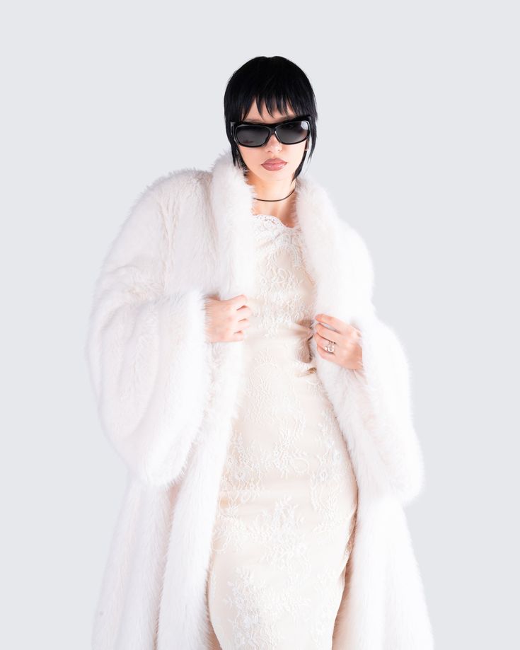 Give off major HBIC vibes in this two-piece set featuring an ivory lace halter mini dress, paired with a midi vegan fur coat 🤍 The perfect blend of classy, and baddie energy - this fit will have everyone bowing down to you 😏 Chic Fluffy Fur Coat For Spring, Chic Fluffy Fur Coat, Chic Fitted Fluffy Fur Coat, Spring Party Fur Coat With Faux Fur Lining, Chic Fluffy Fitted Fur Coat, Elegant Winter White Fur Coat With Faux Fur Lining, Spring Party Fur Coat With Faux Fur Trim, Fitted Fluffy Fur Coat For Spring, Fluffy Fitted Fur Coat For Spring