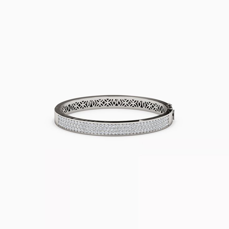 The meticulously crafted floral detailing on the metalwork offers a glimpse into a secret world of shimmering diamonds. Rare Diamonds, Crystal Structure, Light Shadow, Diamond Bangles Bracelet, Vs Diamond, Diamond Bangle, Metal Working, The Row, Bangle Bracelets