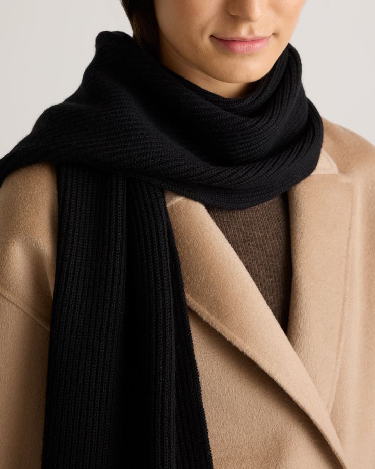 Ready to bundle up this season? Look no further than the Merino Wool Fisherman Scarf. Crafted from 100% merino wool, this scarf will keep you warm in the chilliest weather while giving your outfit a cozy finishing touch.  | Quince | Women's Merino Wool Fisherman Scarf in Black Cozy Merino Wool Scarves For Winter, Casual Merino Wool Scarf For Winter, Classic Winter Scarves For Cold Weather, Warm Wool Scarves For Fall, Knitted Wool Scarves For Fall, Warm Wool Scarf For Fall, Casual Cashmere Scarf For Winter, Casual Black Wool Scarf, Warm Black Scarves For Fall