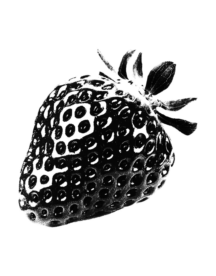 a black and white photo of a strawberry