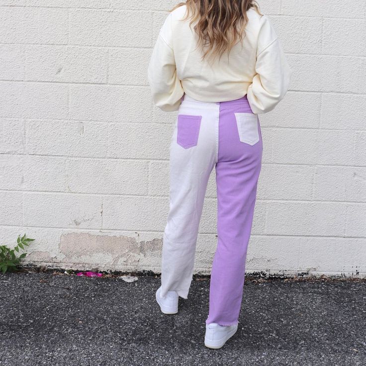 Purple and white color block pants Size and Fit: Model height 5’7” wearing size Small Stretch Wide Leg Color Block Bottoms, Stretch Wide Leg Bottoms With Color Block, White Patchwork Long Pants, Trendy Full Length White Jeans, White Patchwork Bottoms For Spring, White Stretch Trendy Sweatpants, Trendy White Stretch Sweatpants, White Cotton Bottoms With Contrast Color, Stretch Cotton Color Block Bottoms